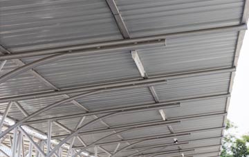 installing Hurliness metal roofing